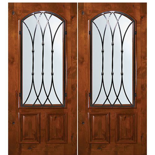 6'-8" Tall Knotty Alder Arch Lite Double Doors with Warwick Wrought Iron Grille