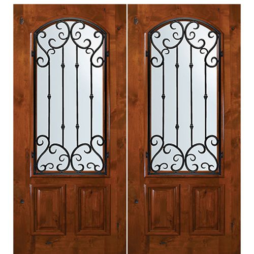 6'-8" Tall Knotty Alder Arch Lite Double Doors with Valencia Wrought Iron Grille